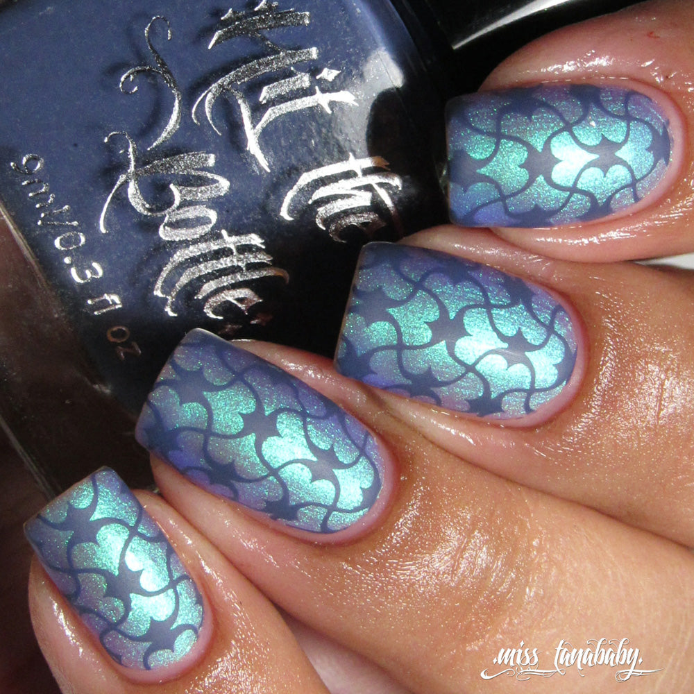 Blue and grey stamped nail art pattern