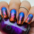 Figures dancing against an orange,pink and blue sky background
