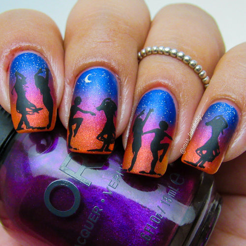 Figures dancing against an orange,pink and blue sky background